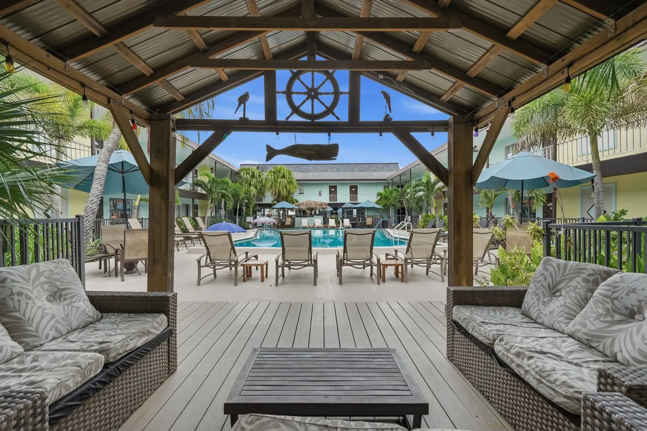 Shaded pavilion looking toward the pool courtyard